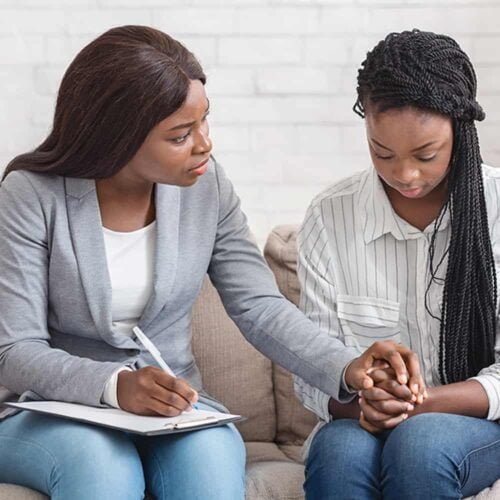 women talking in therapy