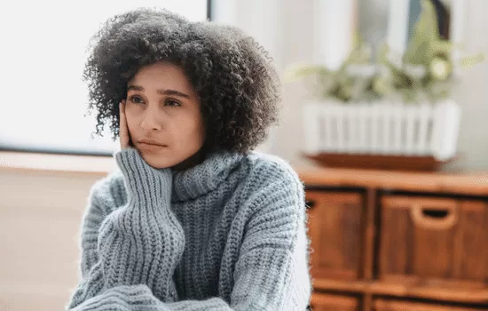 person sitting and thinking